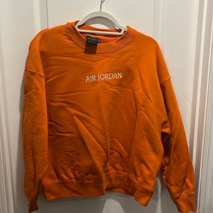 orange air jordan crew neck